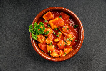 Butter chicken curry tomato sauce poultry meat dish turkey fresh tasty gourmet food background on the table rustic food top view copy space