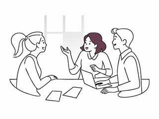 Three Colleagues Brainstorming at Office Table