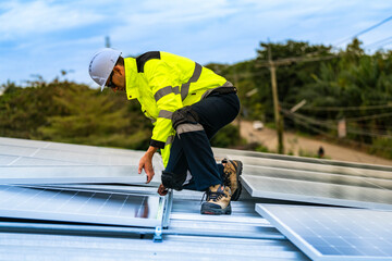 technician lifting a photovoltaic panel during installation, showcasing renewable energy advancement. Dressed in safety gear, reflecting a focus on green energy solutions and sustainable development.