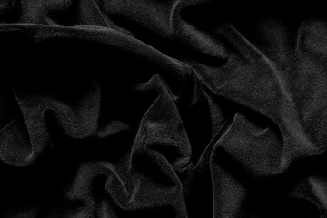 Black velour fabric wavy as background, women's velour tracksuit