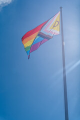 A Pride Flag against Clear Blue Sky