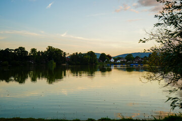Early morning view over a still lake in England