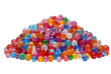 A vibrant cascade of rainbow colored water beads each one shimmering like a tiny jewel on transparent background