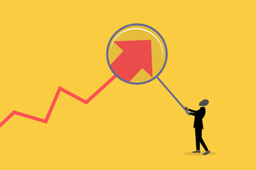 Businessman using magnifying. concept of Business investment, analysis, opportunity,and consulting
