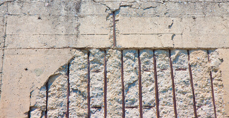 Poor and damaged concrete cover and corrosion of reinforcement bars with oxidation - fragments of...