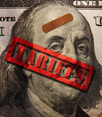 Hundred dollar bill with bandage and red Tariffs stamp