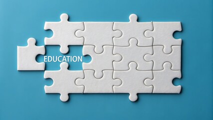 White puzzle pieces on blue background with one missing piece labeled "EDUCATION.
