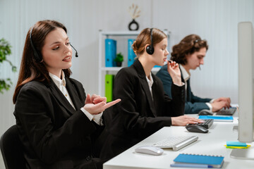 Customer Service Representatives Working in Modern Office Environment