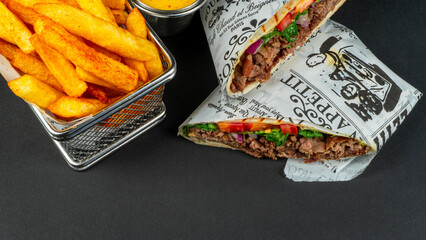 Delicious Beef Wrap Shawarma with Fresh Vegetables and French Fries,top view
