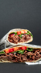 Delicious Beef Wrap Shawarma with Fresh Vegetables and French Fries,copy space