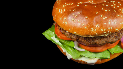 Fresh beef burger isolated on black