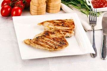 Grilled pork steak with sauce