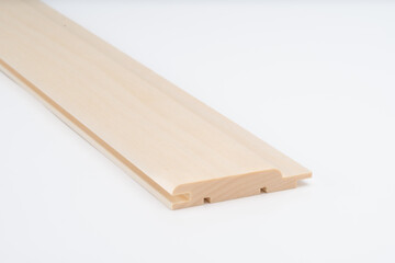 Light wood frame profile with detailed grooving, shown on white background. Precision-cut construction component for joinery or trim work..