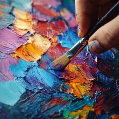 Fototapeta premium Close-up of an Artist's Hand Applying Oil Paint with a Brush: Vibrant Colors and Textures in an Impressionistic Style, Showcasing the Creative Process