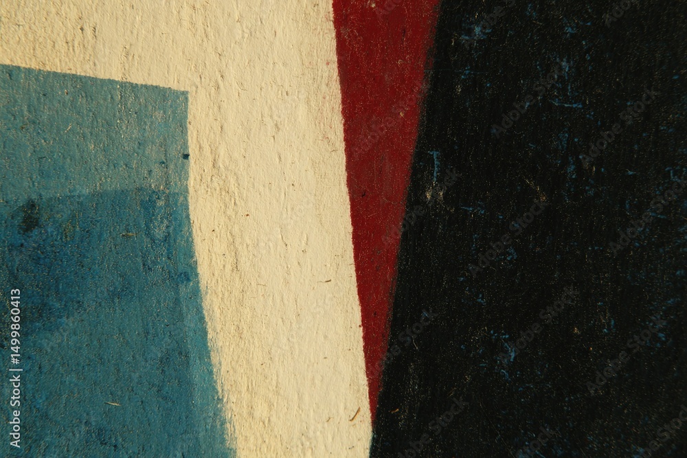 Poster abstract shapes and colors create a striking visual composition in an indoor setting emphasizing con