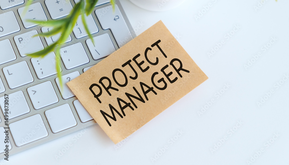 Poster project management text on the desk and keyboard on white background