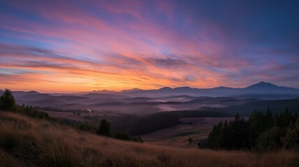Fototapeta premium Golden sunset over a serene landscape, warm light through clouds, orange and purple hues blending in harmony