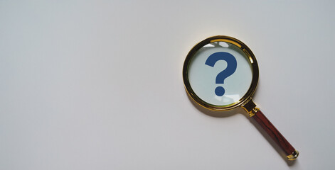 International ask a question day concept, Magnifying glass focused on question mark, Answer, Q&A,...