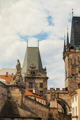 Visitors admire the stunning architecture of Pragues historic Charles Bridge