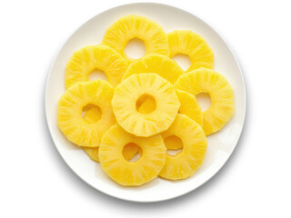Slices of fresh pineapple arranged on a white plate showcasing their vibrant yellow color and texture