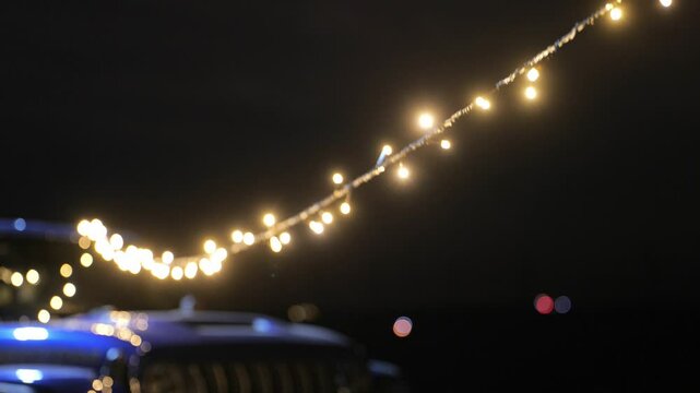 Night Desert Camp with City Lights KSA