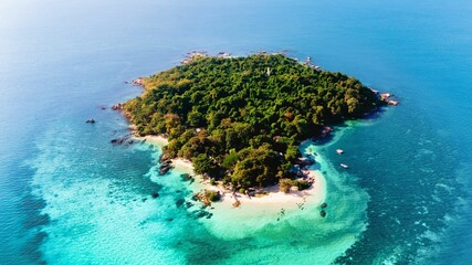 Koh Munnork Island in Rayong captivates visitors with its turquoise waters and lush landscapes. Relax on peaceful beaches, enjoying natures beauty in this tropical paradise in Thailand.