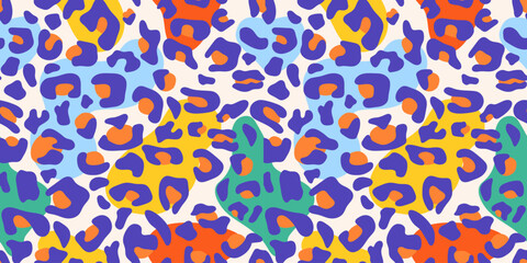 Leopard seamless pattern in vibrant pop-art colors. Trendy Abstract animal skin print featuring bold purple, green, blue, orange, and yellow spots. For kids and summer wear, and Y2K-style design.