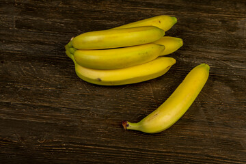 a bunch of bananas on a blackboard close-up