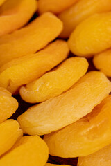 dried pitted apricots are yellow in color, a lot of dried apricots are dehydrated after removing the seeds