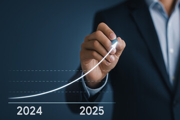 Fototapeta premium Businessman Drawing Rising Growth Curve Showing Business Success and Financial Forecast from 2024 to 2025