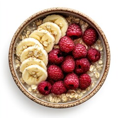 Oatmeal bowl topped with sliced bananas and raspberries