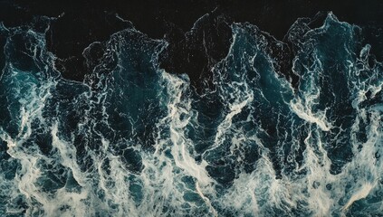 Obraz premium Top-down view of foamy ocean waves