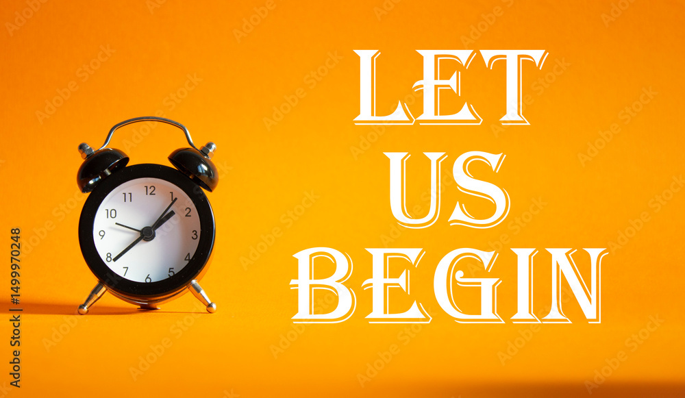 Canvas Prints let us begin symbol. concept word let us begin on beautiful orange background with alarm clock. busi