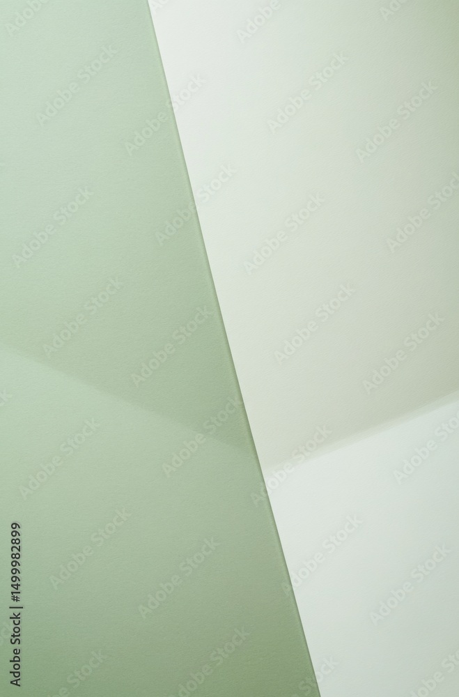 Poster flat lay of light green and white paper with subtle gradient, featuring a soft-edged triangular shap