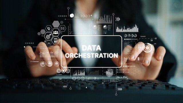 Professional in Suit Engaged in Data Orchestration with Digital Graphics representing Technology and Analysis Concepts. Asymptotic smart data analytic.