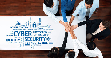 A diverse team conducts a collaborative meeting focused on enhancing cybersecurity strategies,...