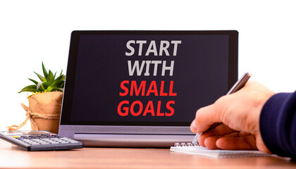 Start with small goals symbol. Concept words phrase Start with small goals on beautiful black...