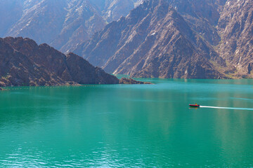landscape view of Hatta dam lake and Hajar mountain in the Dubai, United Arab Emirates