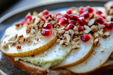 This sandwich features layers of crisp apple slices garnished with pomegranate seeds and chopped nuts, presenting a refreshing option perfect for a snack or light meal