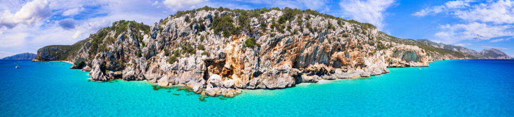 Best and most beautiful beaches of Sardegna island (Italy) - Cala Luna in gulf of Orosei a spectacular national park, Aerial panoramic drone view
