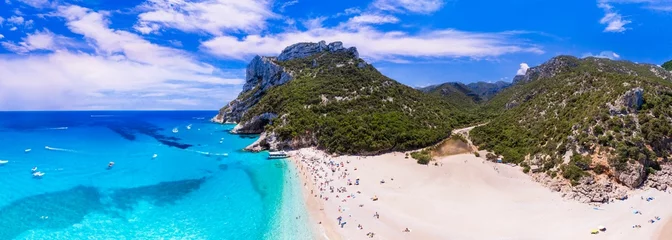 Gordijnen Best and most beautiful beaches of Sardegna island (Italy) - impressive Cala Sisine in gulf of Orosei . Aerial panoramic drone view of white sandy beach and turquoise sea © Freesurf