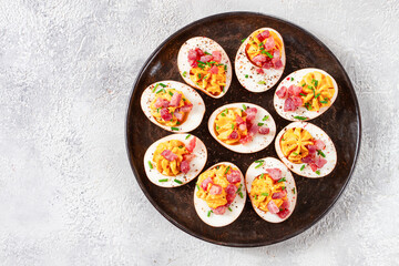 Spicy, stuffed ramen eggs, with bacon and green onions, homemade, no people,