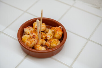 Assorted Italian appetizers on rustic wooden board with vibrant Mediterranean ingredients