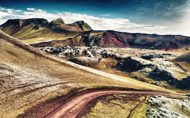 Road across the mountains of Landmannalaugar, Iceland in summer season from drone - Europe