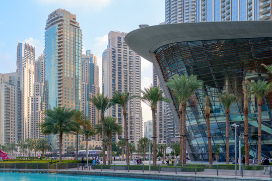 Dubai, United Arab Emirates - February 26, 2024: Dubai opera and skyscrapers of Dubai downtown district in background