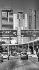Bangkok, Thailand - December 15, 2019: Rush hour in Bangkok with dense traffic and colorful vehicles filling the city roads