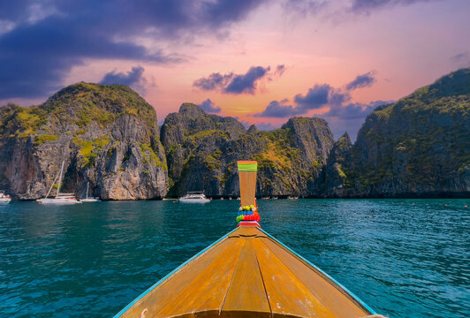 Travel concept, Phi Phi island maya bay beach in Thailand at sunset from traditional boat