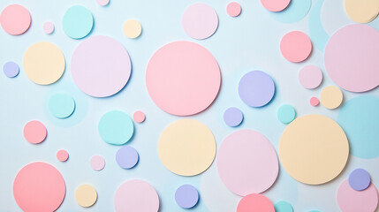 Pastel colored paper circles arranged in a scattered pattern on a light blue background creating a minimalist aesthetic design.