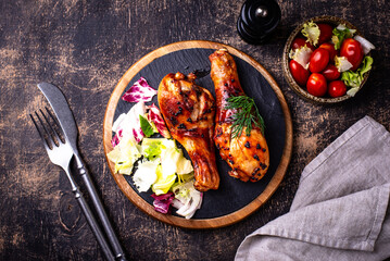 Roasted chicken drumsticks with vegetables