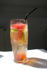 classic cocktail, cape cod served in a glass isolated on a white background 
